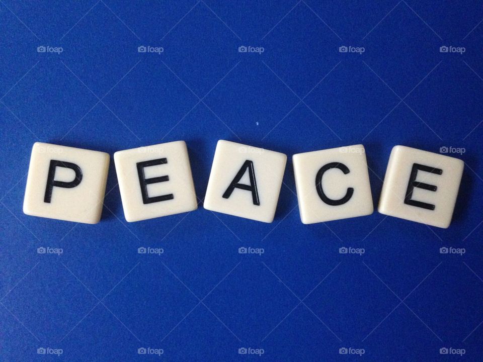 Peace. Word peace made with letter tiles