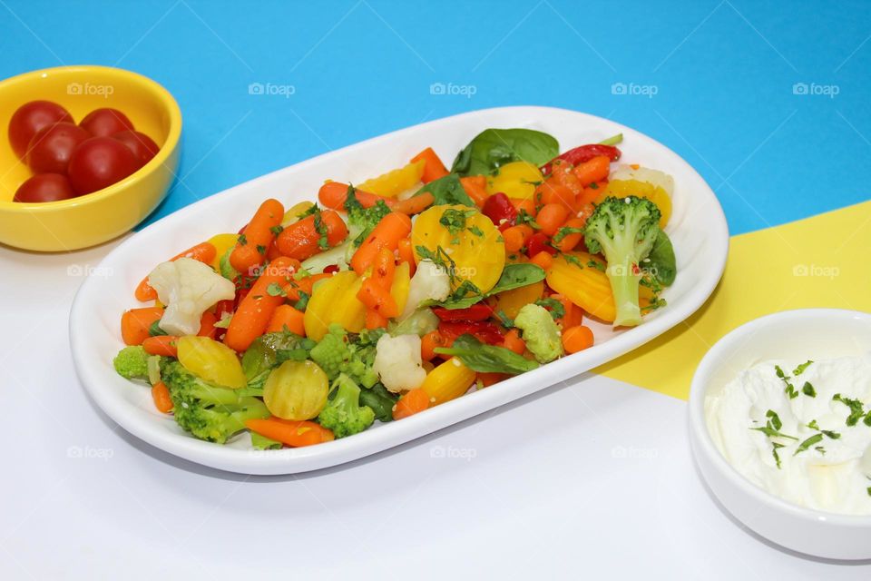 Boiled vegetables on a white plate