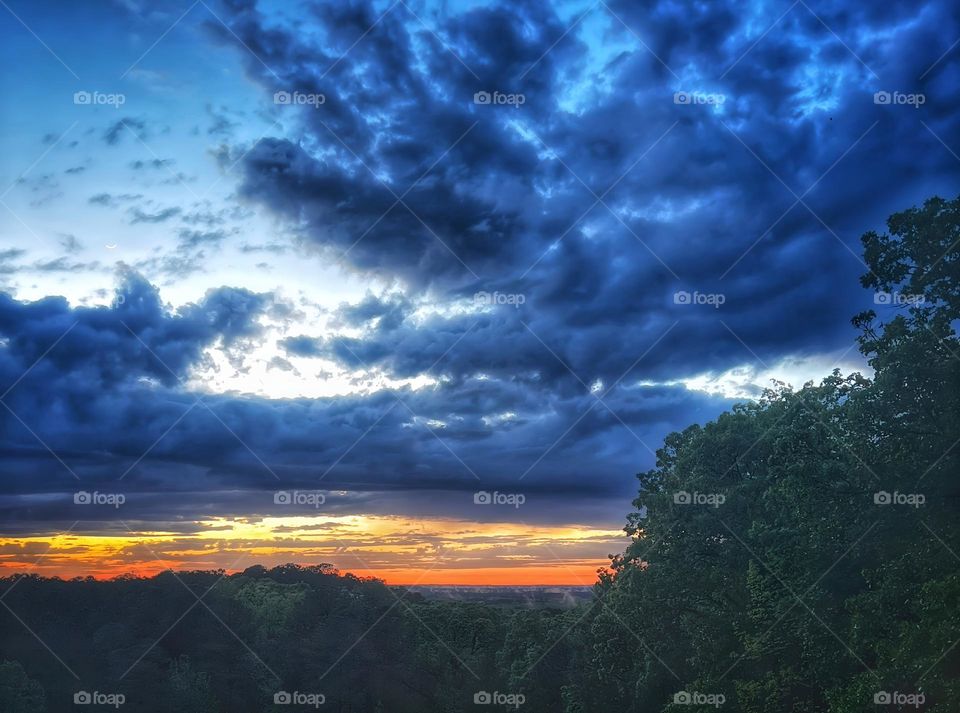 The colors of the sunset as it goes down below the horizon leaving a beautiful array of colors.