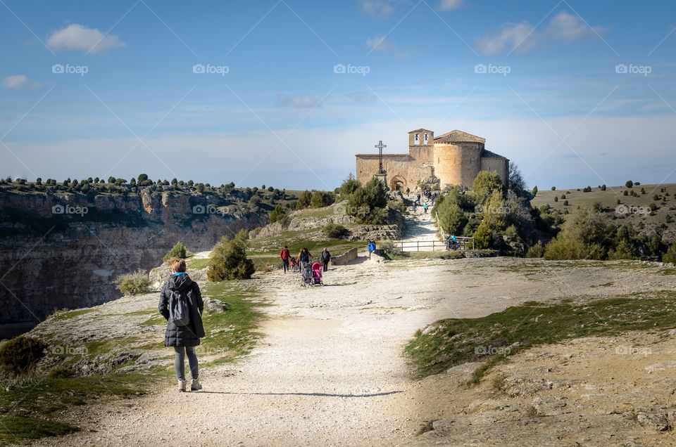 Woman walking to the chapel 