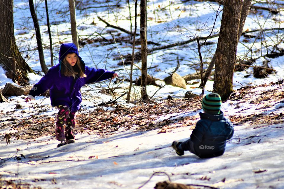 kids sledding without sleds