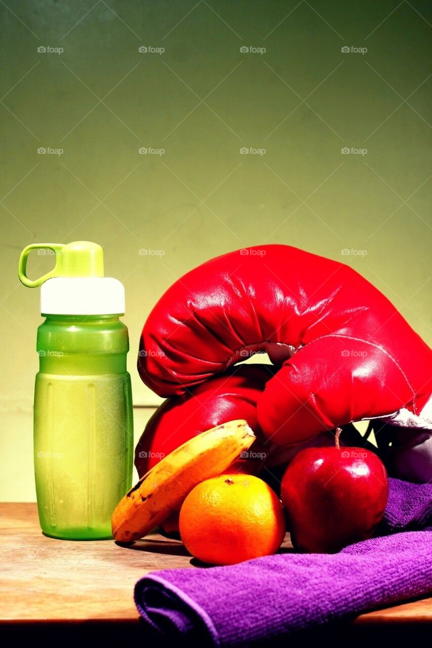 Water, fruits, and boxing gloves