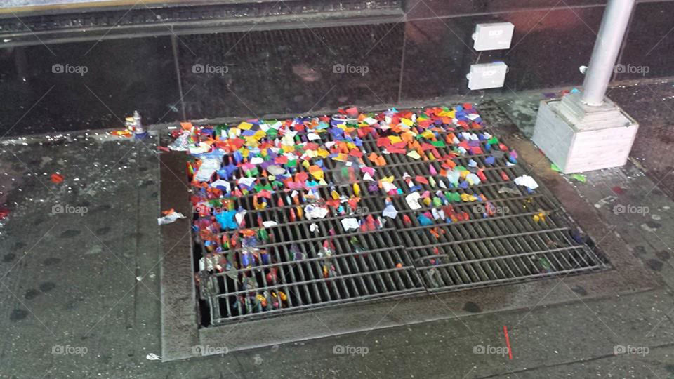 confetti from New Year's Eve. leftover confetti from New Year's Eve on the streets of NYC