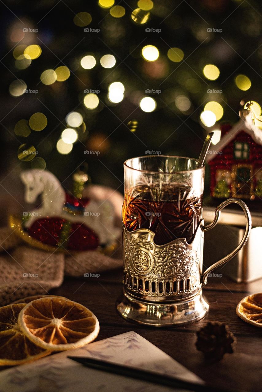 Retro still life tea in a glass and oranges