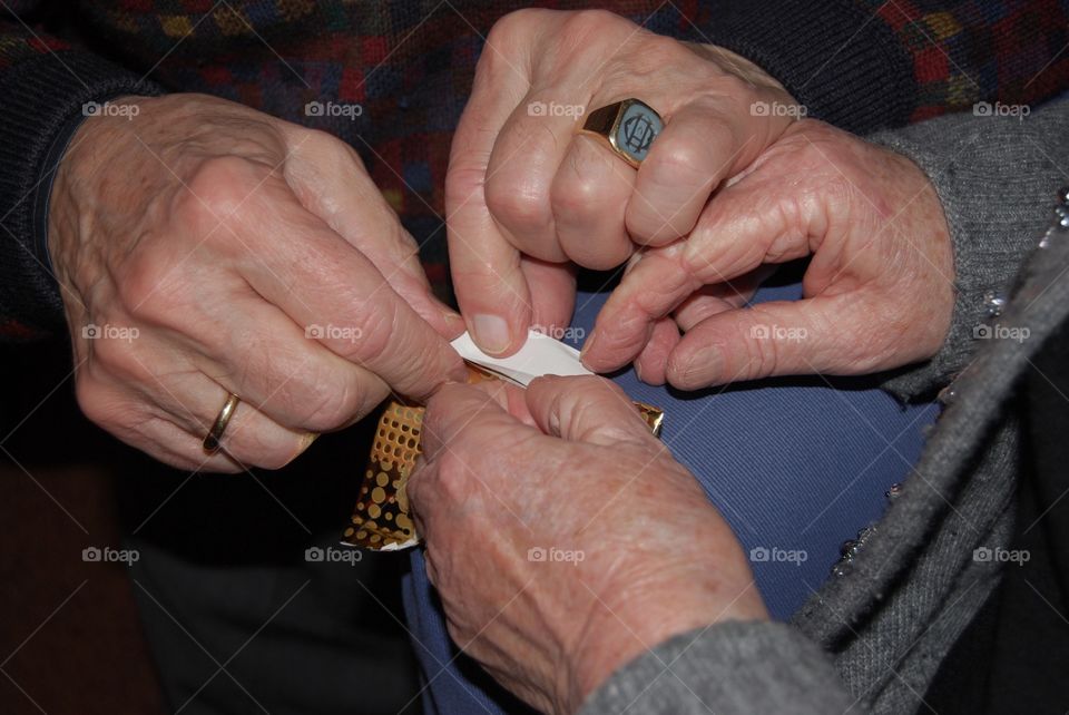 Grandparents unpacking a gift