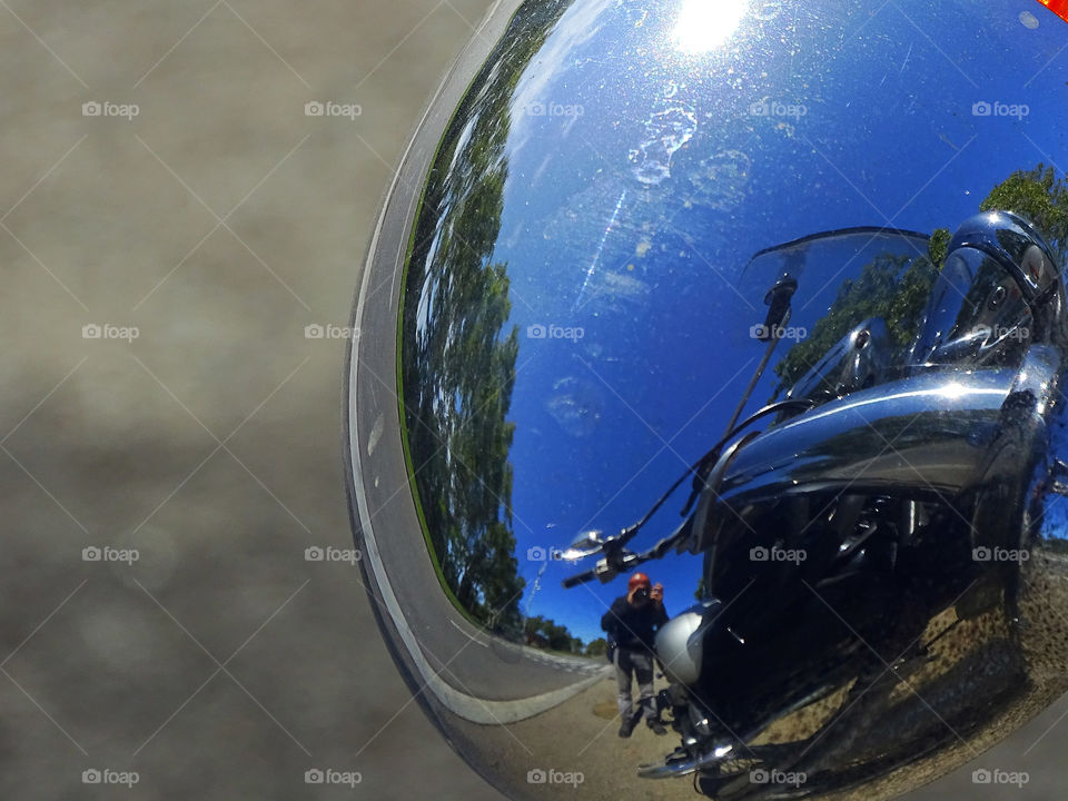The reflection of the motorcycle