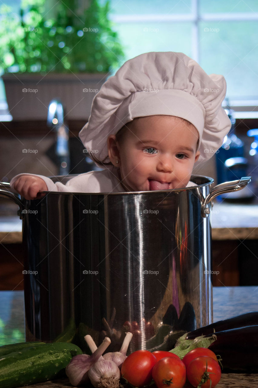 Close-up of cute baby chef