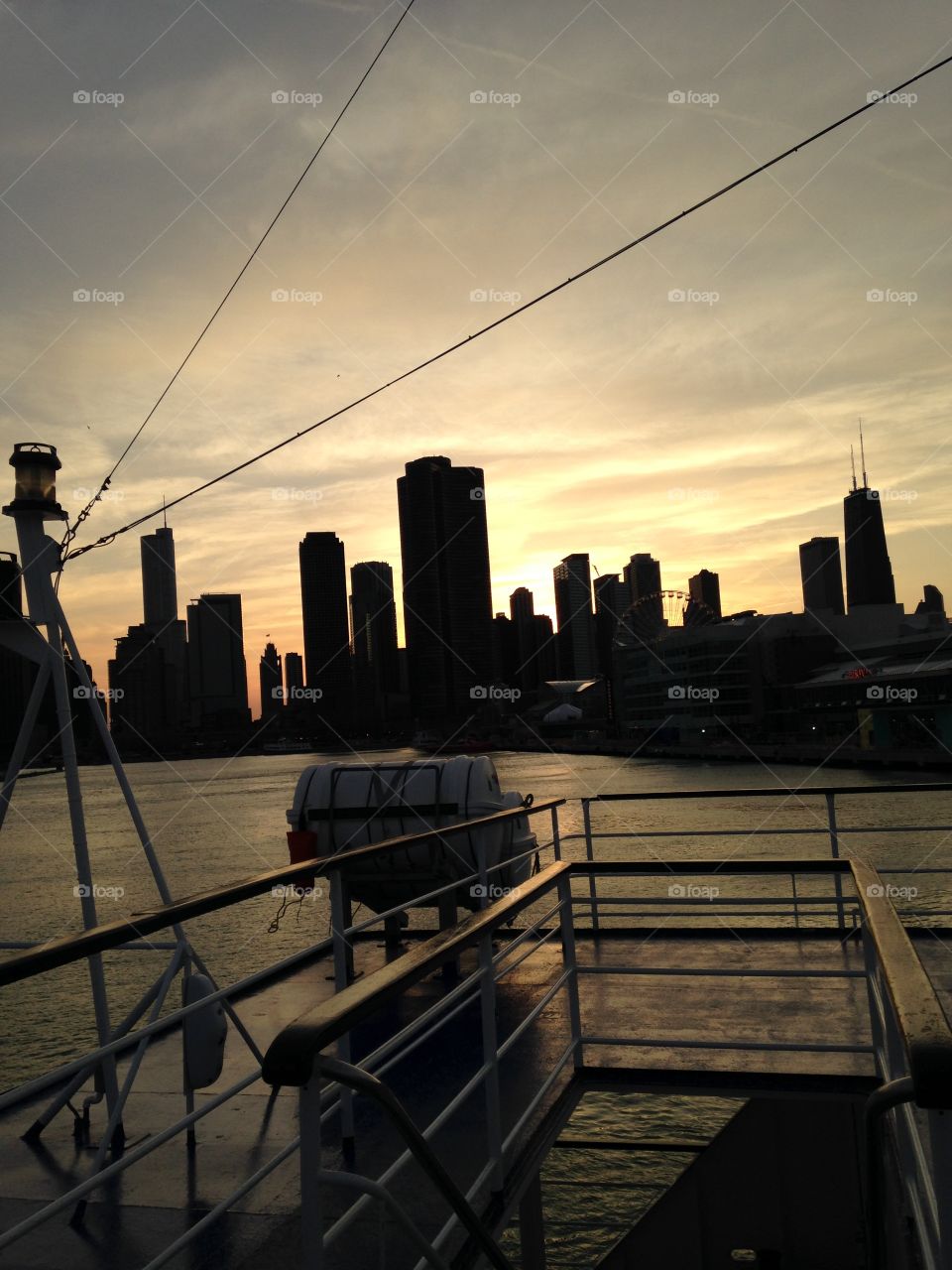 Chicago sunset behind the skyline. Taken while on "The Spirit of Chicago".