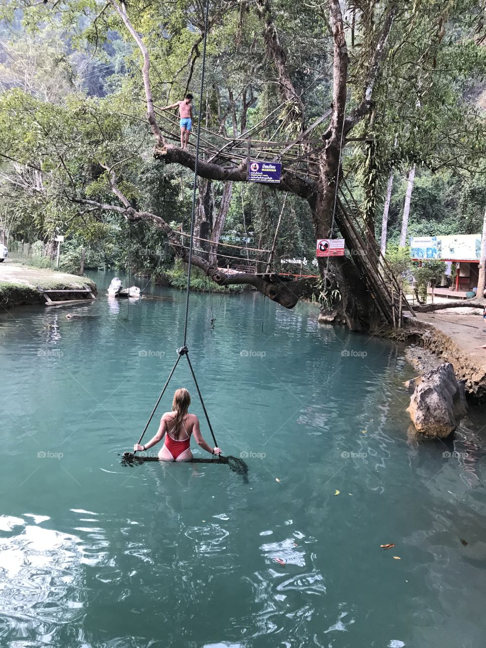 Swinging at the Blue lagoon in Laos. Beautiful country and amazing people. 