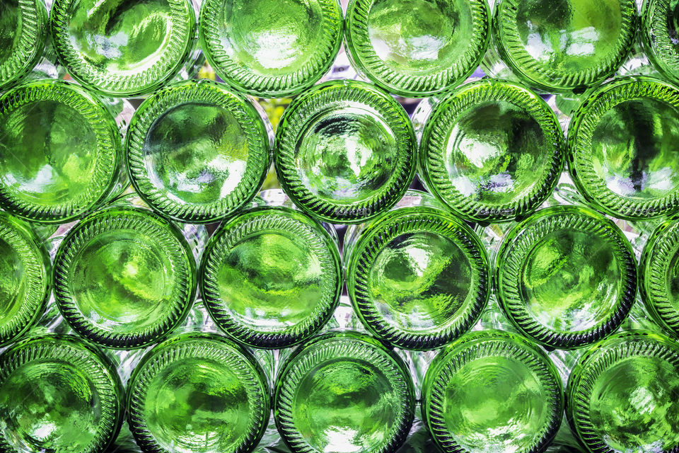 Full frame of green bottles