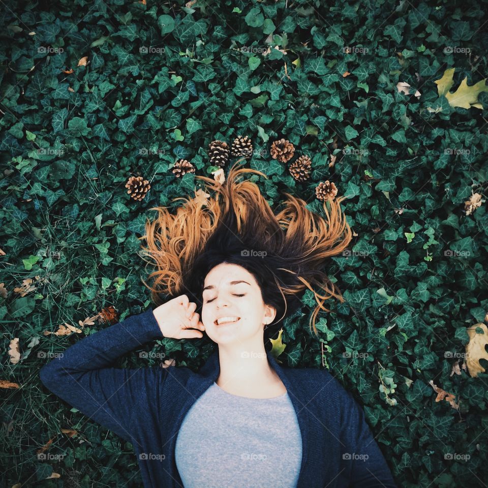 Smiling girl on the grass