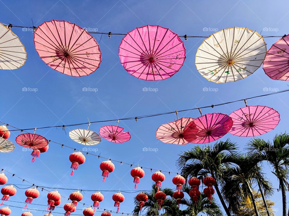 The beautiful decoration of umbrellas and lanterns.