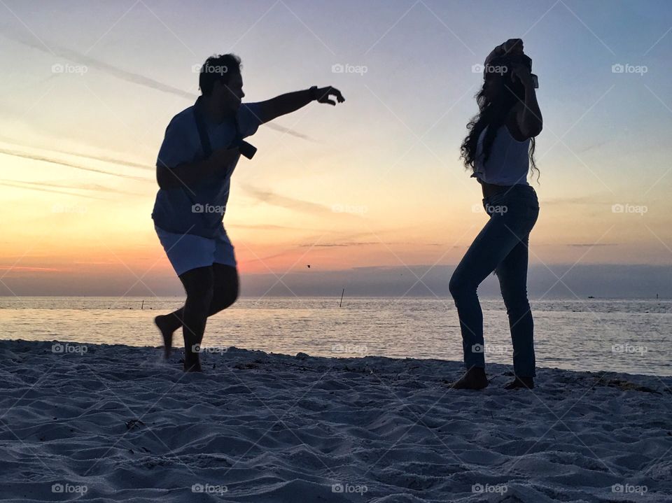 Model on the beach at sunrise 