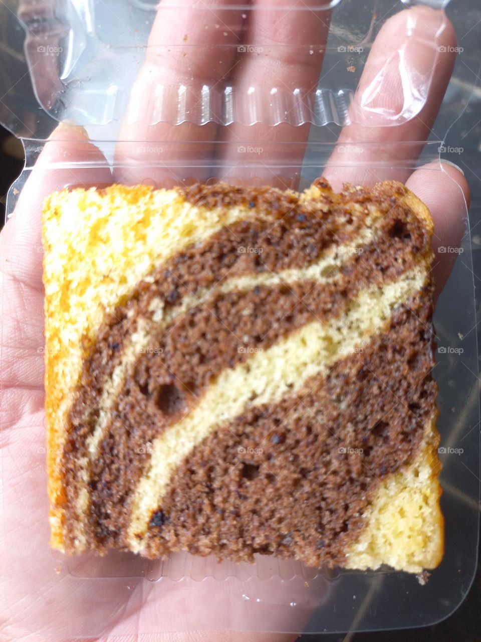 Marble cakes are cakes with a streaky or speckled appearance that are achieved by mixing light and dark dough very lightly.