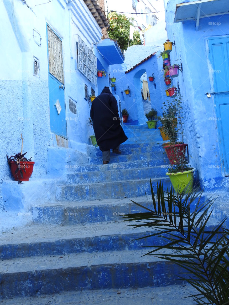 Traditional man walking the alley