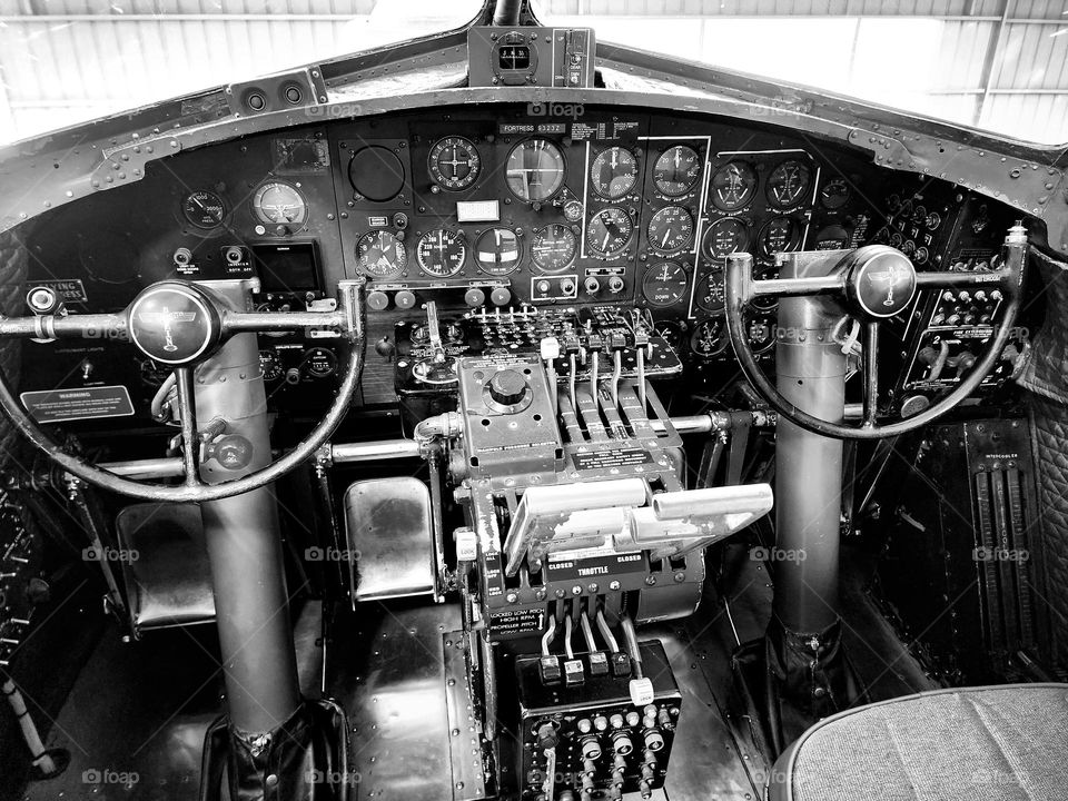 The cockpit of a operational Boeing B-17G made in 1945 recreated in black and white to be era specific