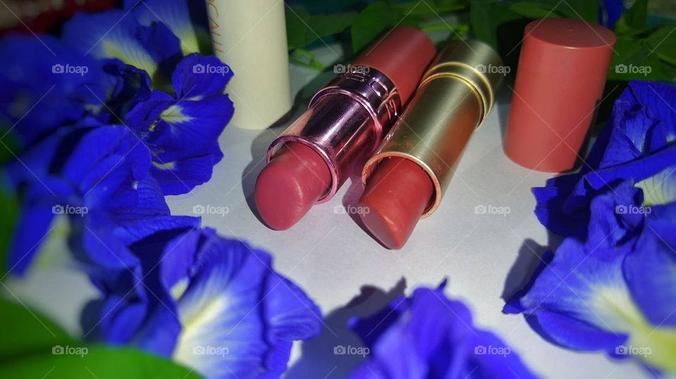 2 different shades of pink lipstick