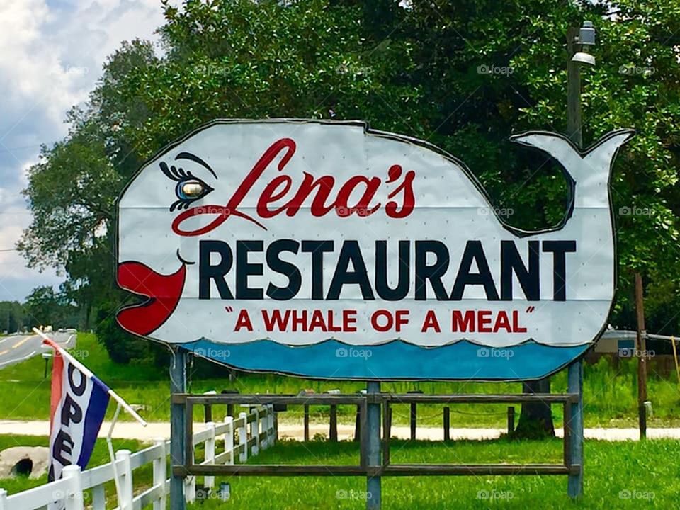 Old fashioned restaurant sign spotted while driving along a rural road out in the country 