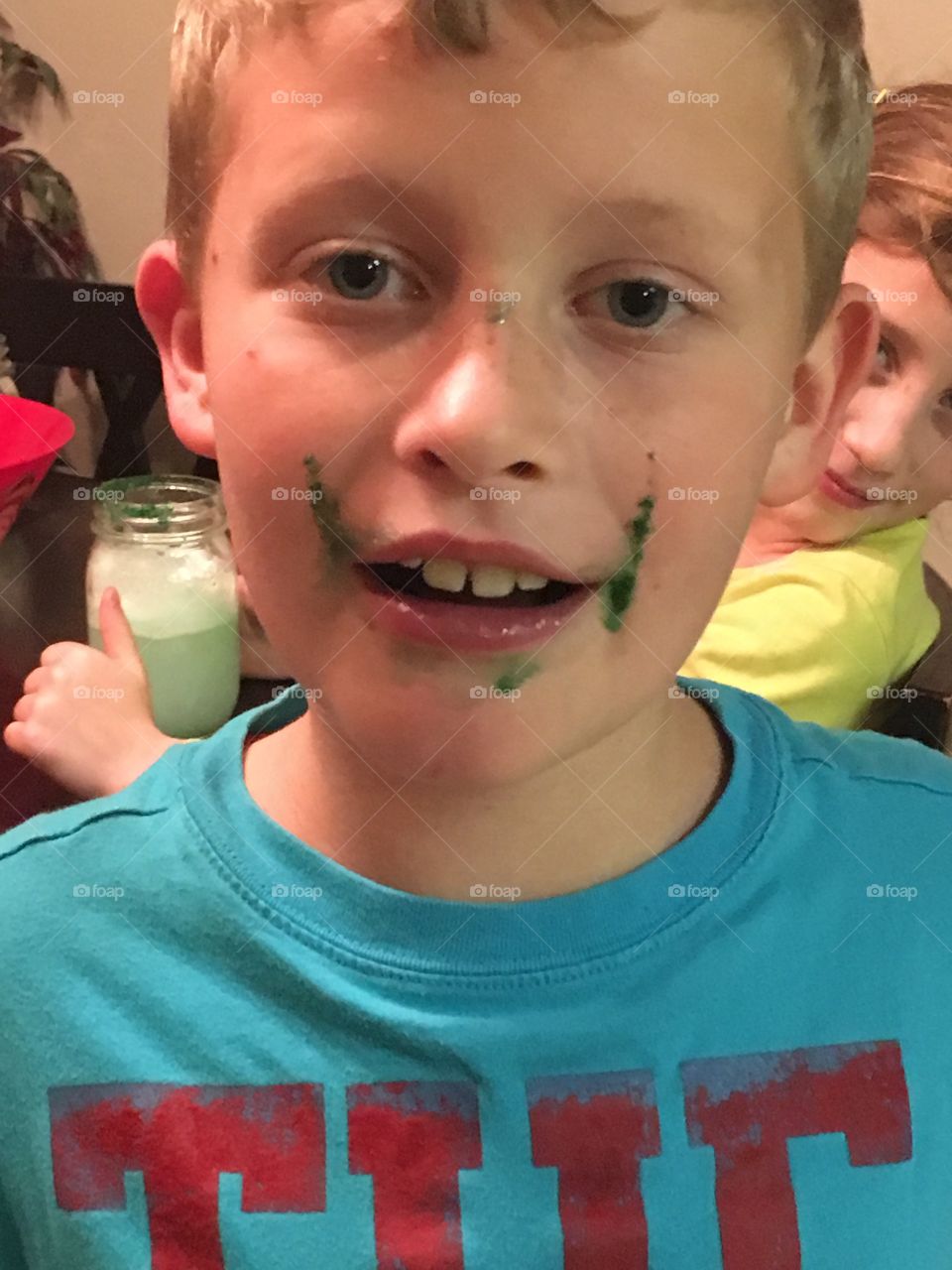 Portrait of boy with messy mouth