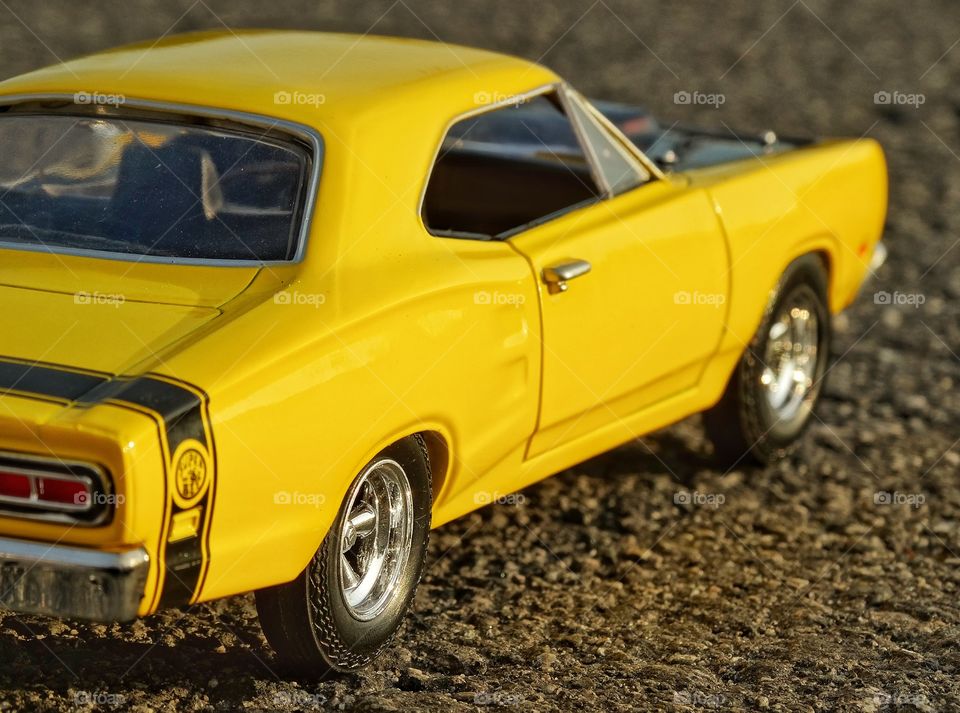 Yellow Toy Car. Shiny Toy 1969 Dodge Coronet
