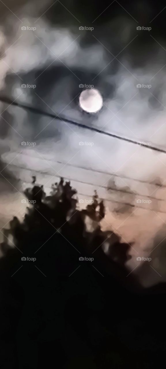 The night sky with a full moon