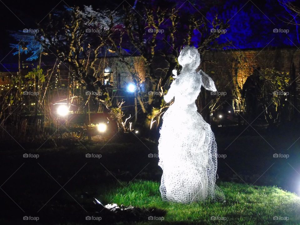 Beautiful garden Fairy, wire sculpture, magic atmosphere