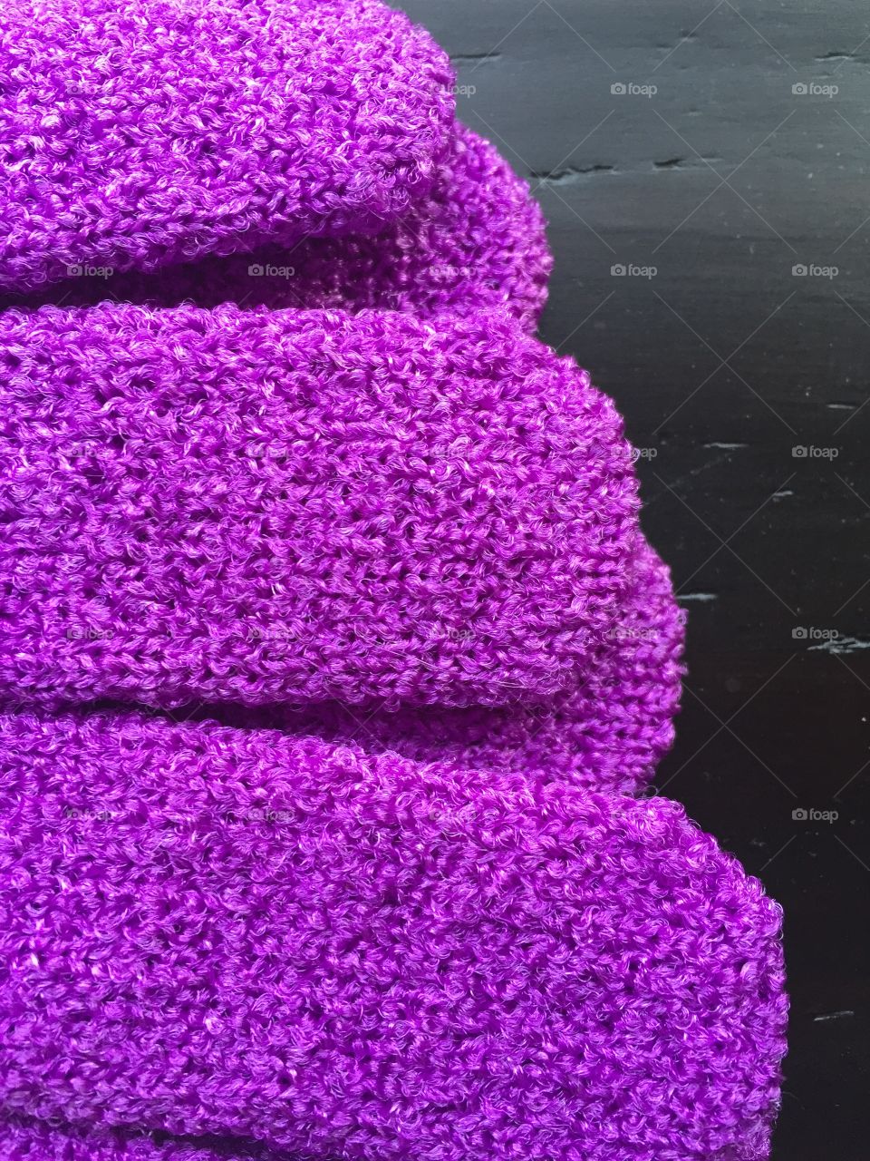 Macro shot purple woolen gloves