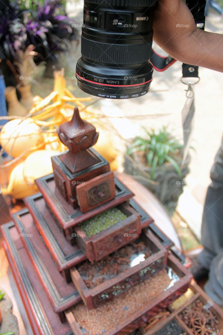 photo shoot of typical Indonesian spice storage items.