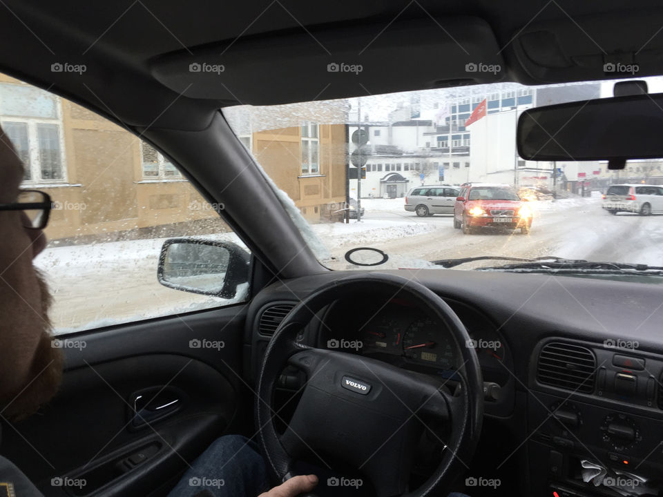 Man driving a car