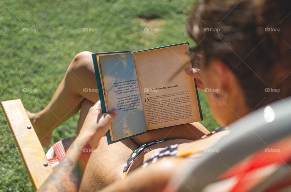 reading book in the sun