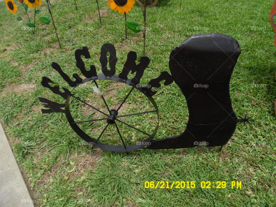 Texas welcome . this is a picture of a Texas sign that I saw sitting in front of a gift shop in Mineral Wells 