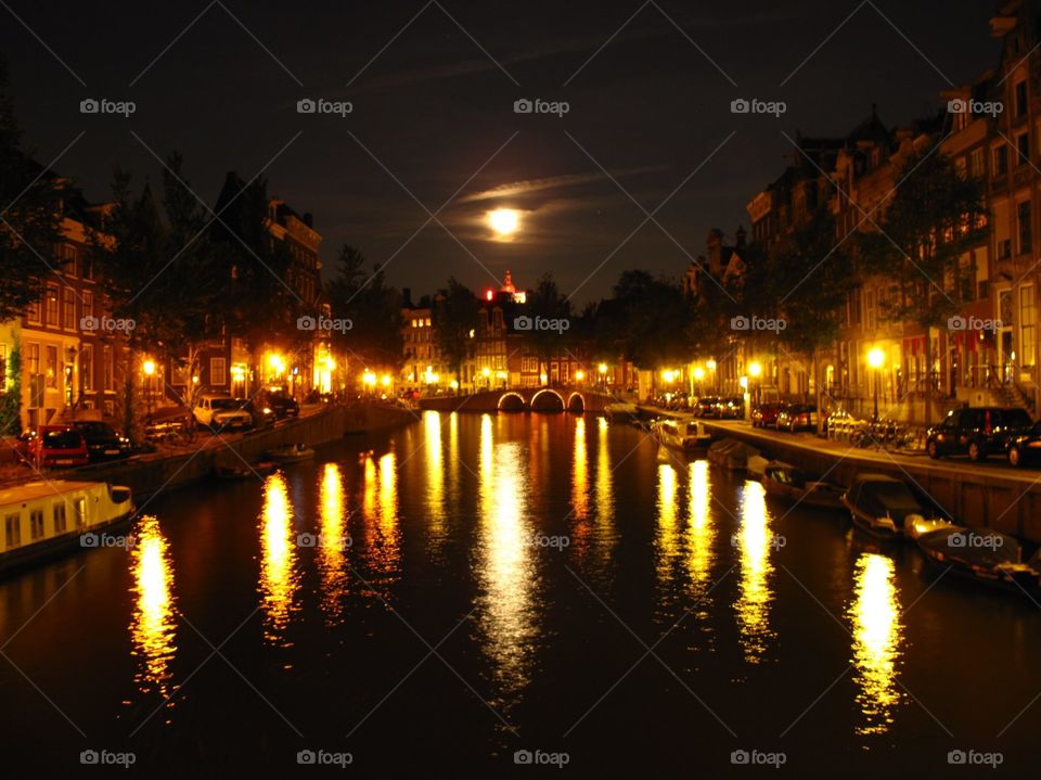 Full moon over the canal in Amsterdam 