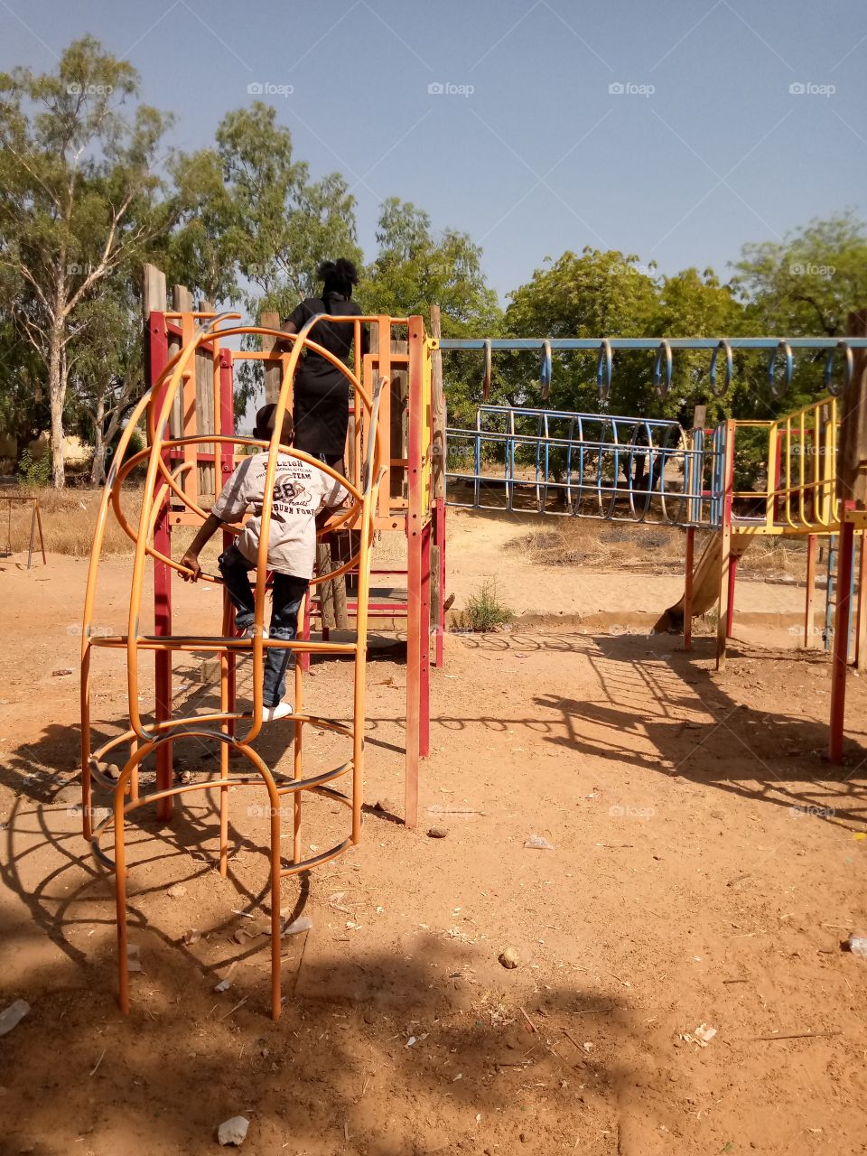 my children at the zoo playing and catch fun