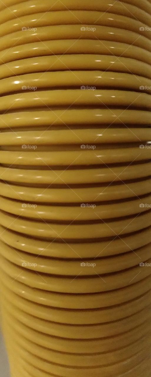 yellow round tube