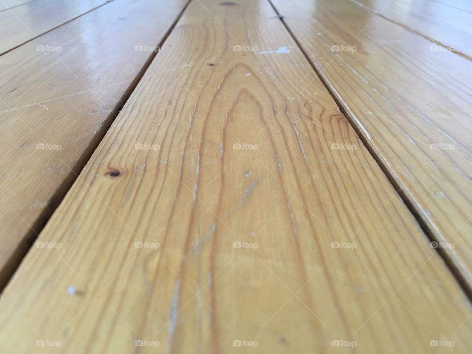 Wooden floor surface with multiple gaps stock image