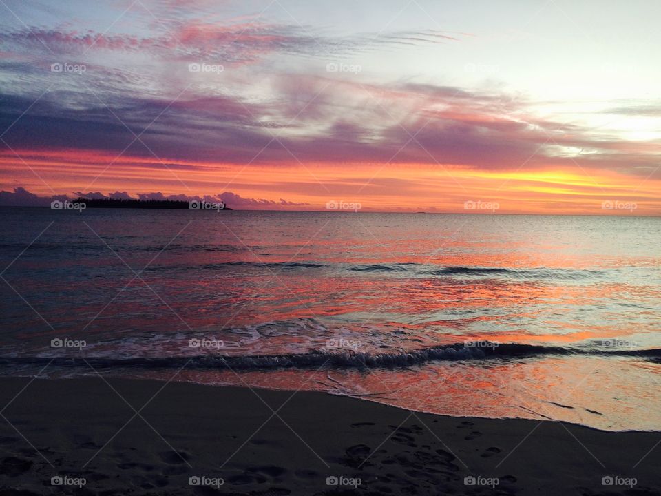 Sunset on paradise island beach