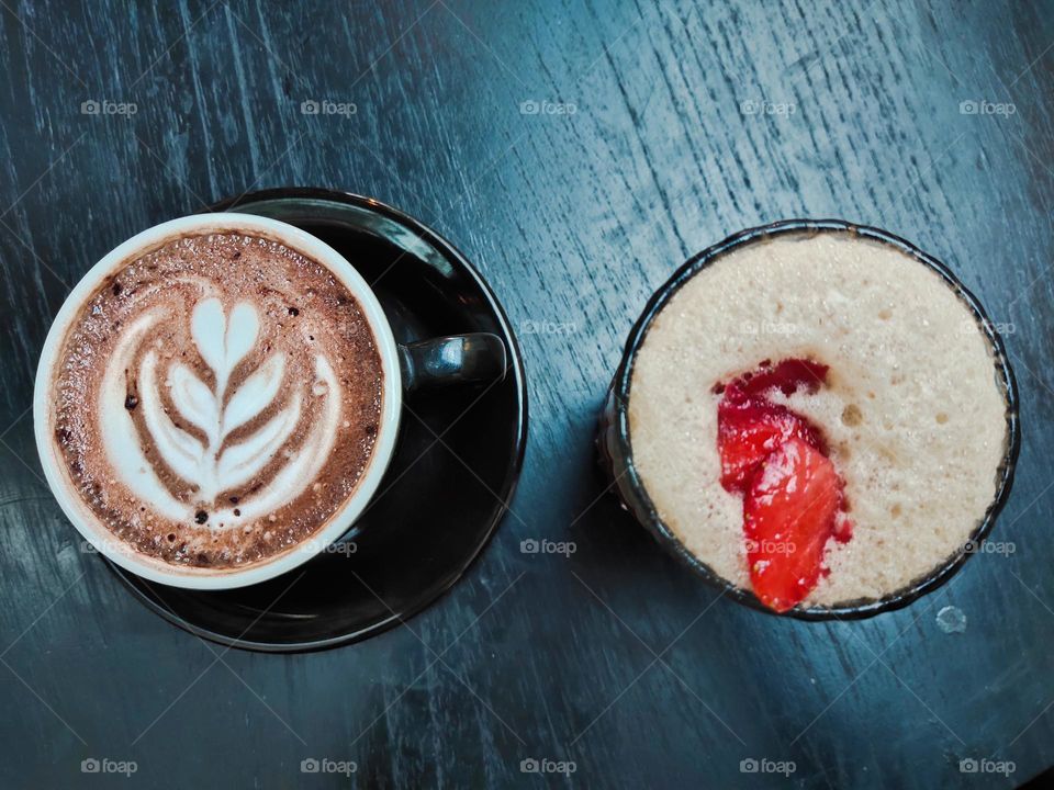 tulip latte art pattern and strawberry cold brew