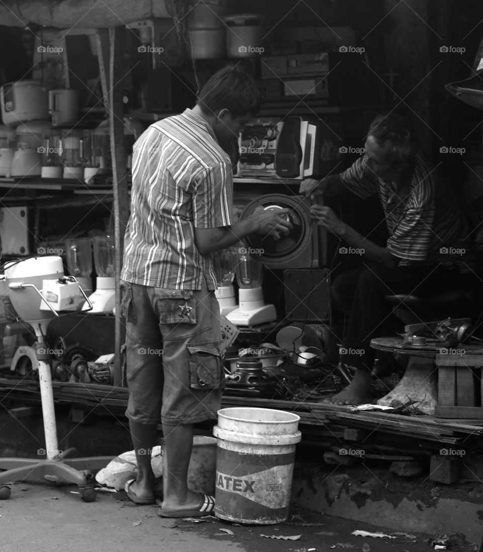Secondhand street vendors activity near Kebayoran Railway Station, Jakarta