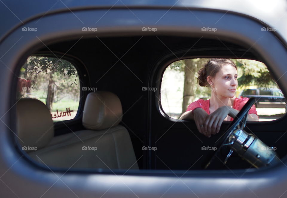 Woman standing outside the car