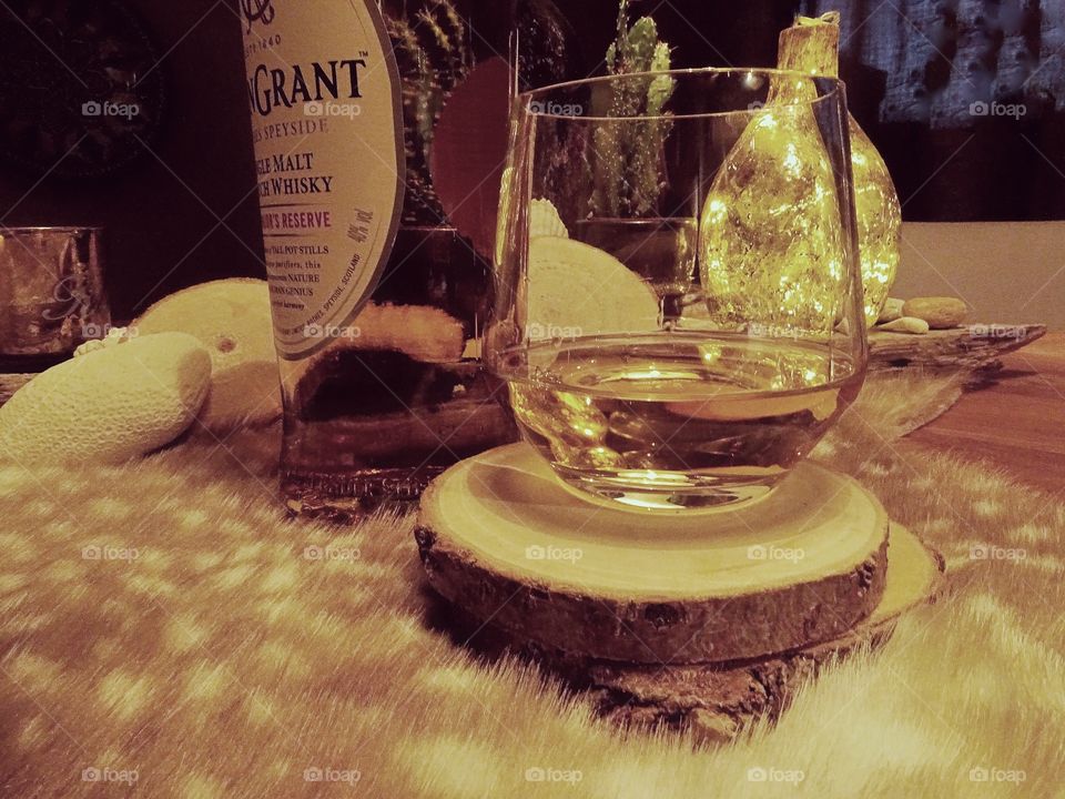 Whisky bottle and glass