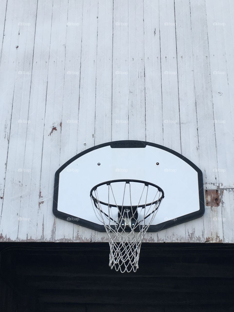 Basketball hoop on the barn