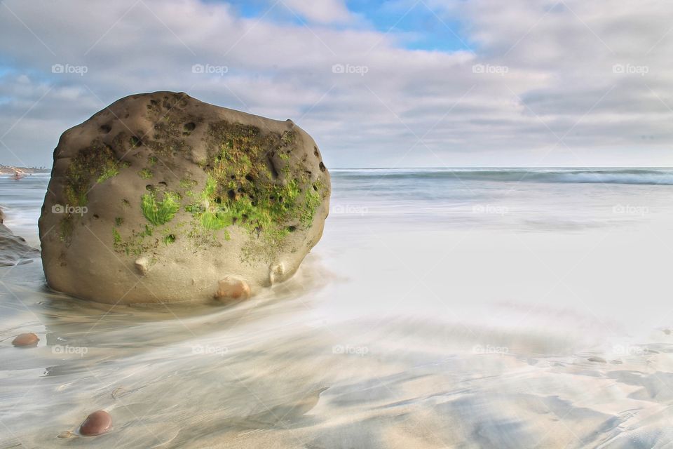 I am a rock. I am an island. Walking along the beach I saw these sand stone rocks that had such wonderful textures. 