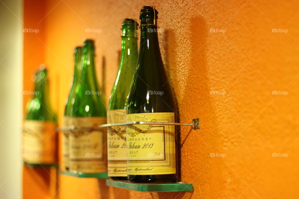 Bottles of wine used as a wall decor