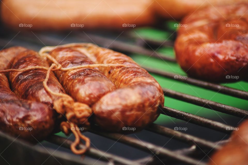 Close-up of meat on grill