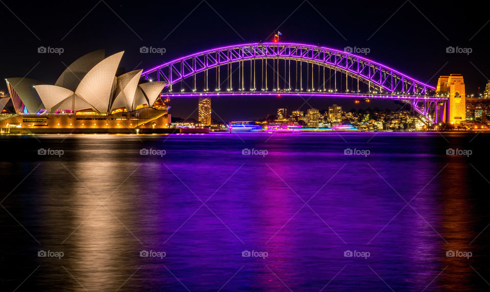 Sydney, Australia - May 29, 2016: Sydney Opera House and Harbour Bridge by night. Viewed from Mrs Macquarie's Chair. High resolution long exposure image.