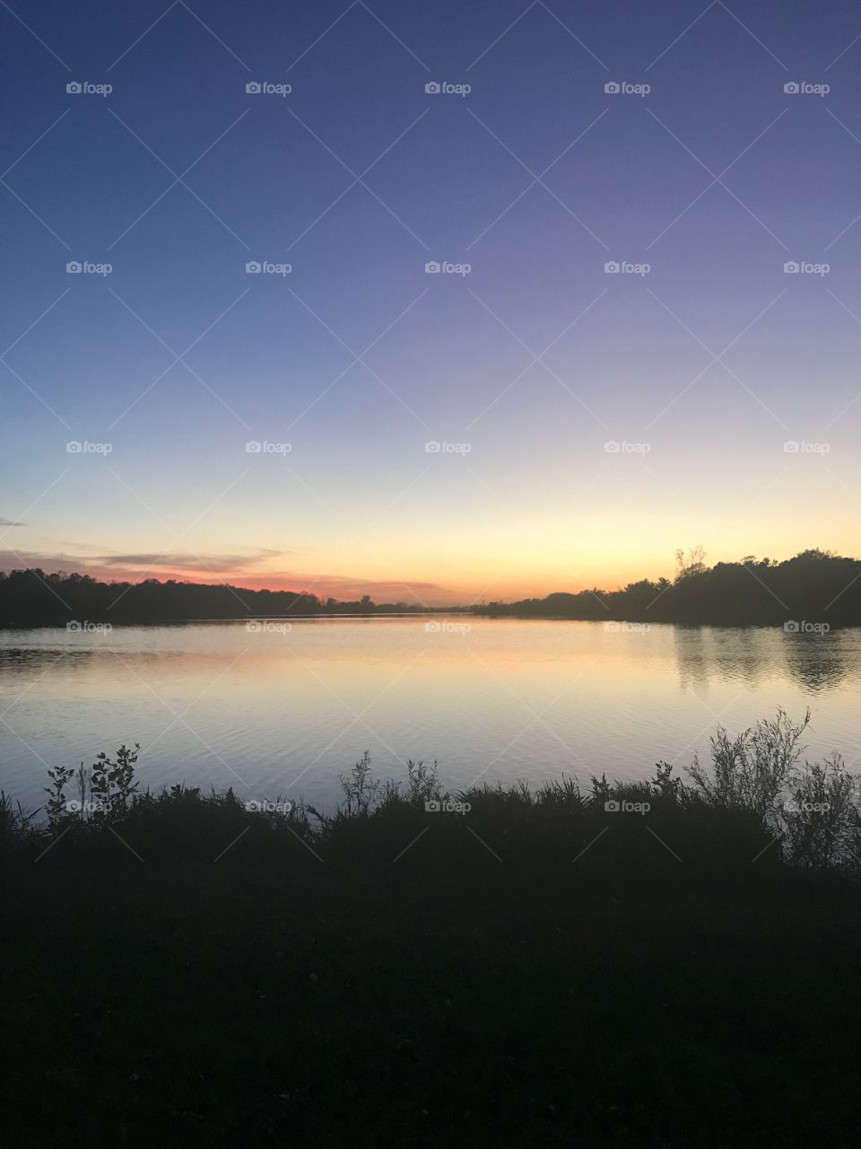 Beautiful sunset over the Prairie Rose Lake in Iowa