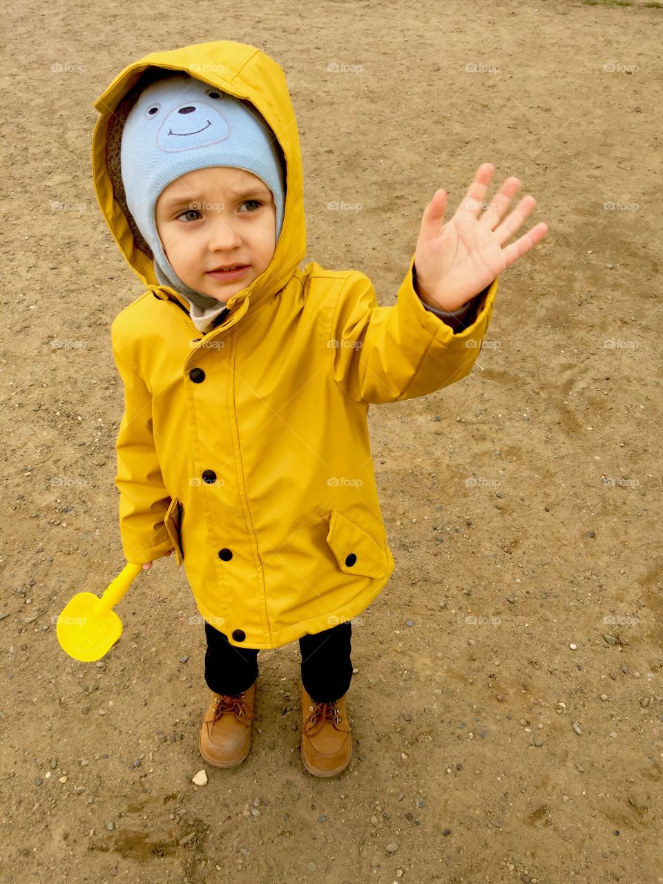 Kid in yellow watercoat 