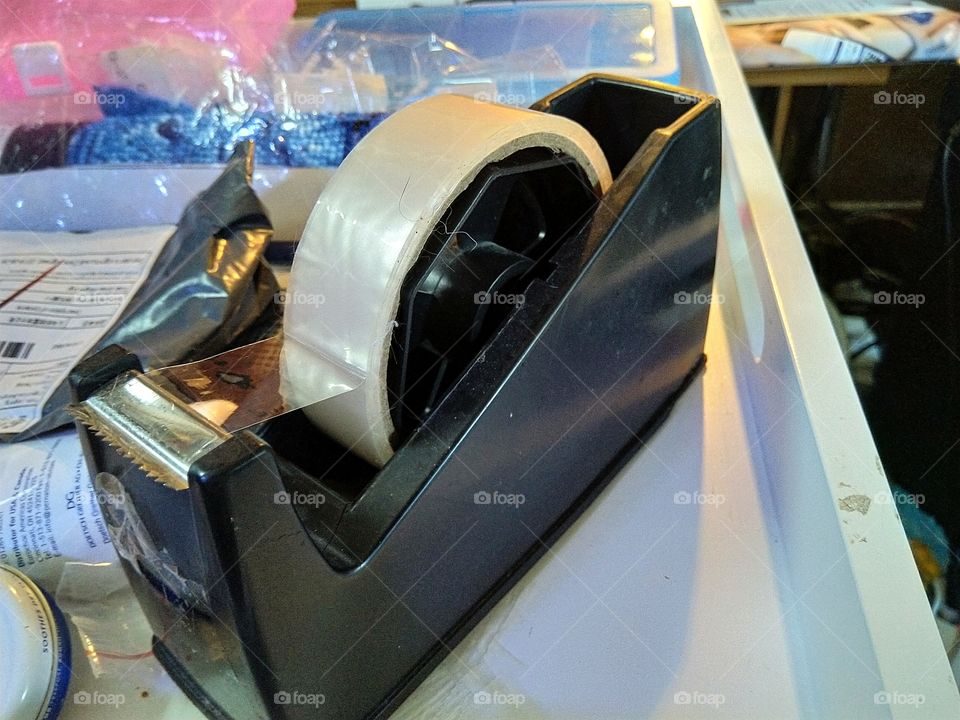 sellotape holder with sellotape in it