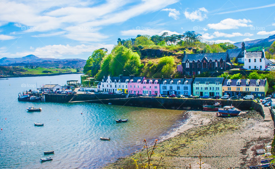Colourful cottages line the Isle of Skye harbour town of Portree, Scotland