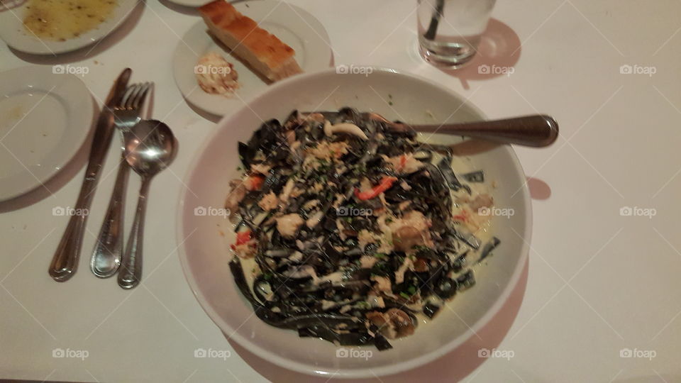 Black squid ink Fettuccine with Lobster and mushroom  cream sauce